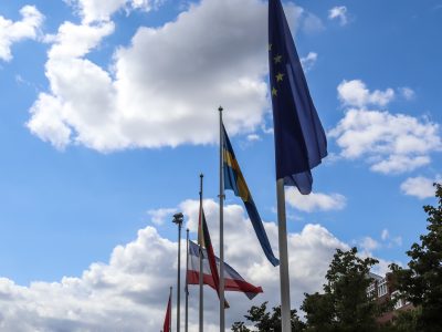 33147282_european-union-flag-at-a-flagpole-moving-slowly-in-the-wind-agai